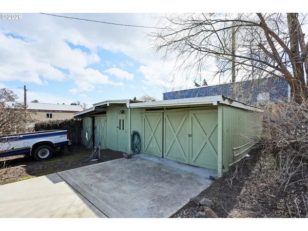 a view of outdoor space and car garage