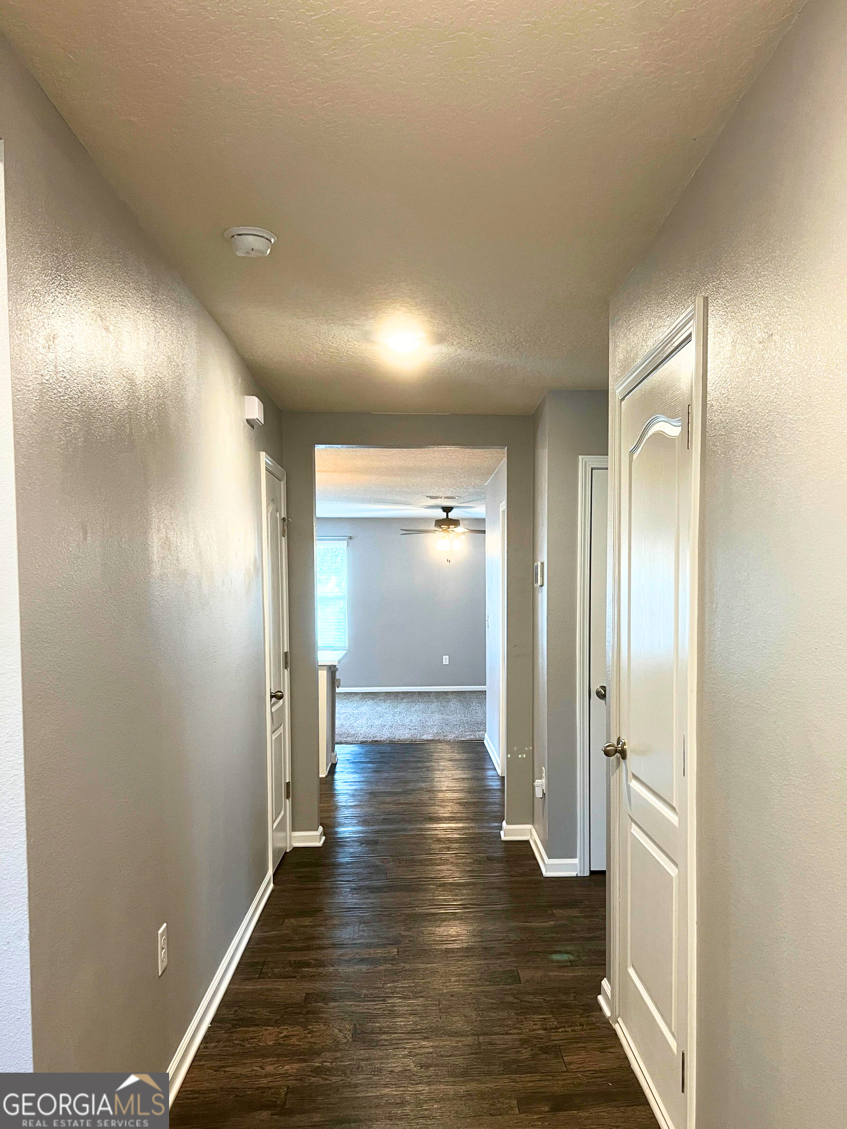 129 Holston Circle Kingsland, GA 31548 - Photo 2 of 25 a view of a hallway with wooden floor