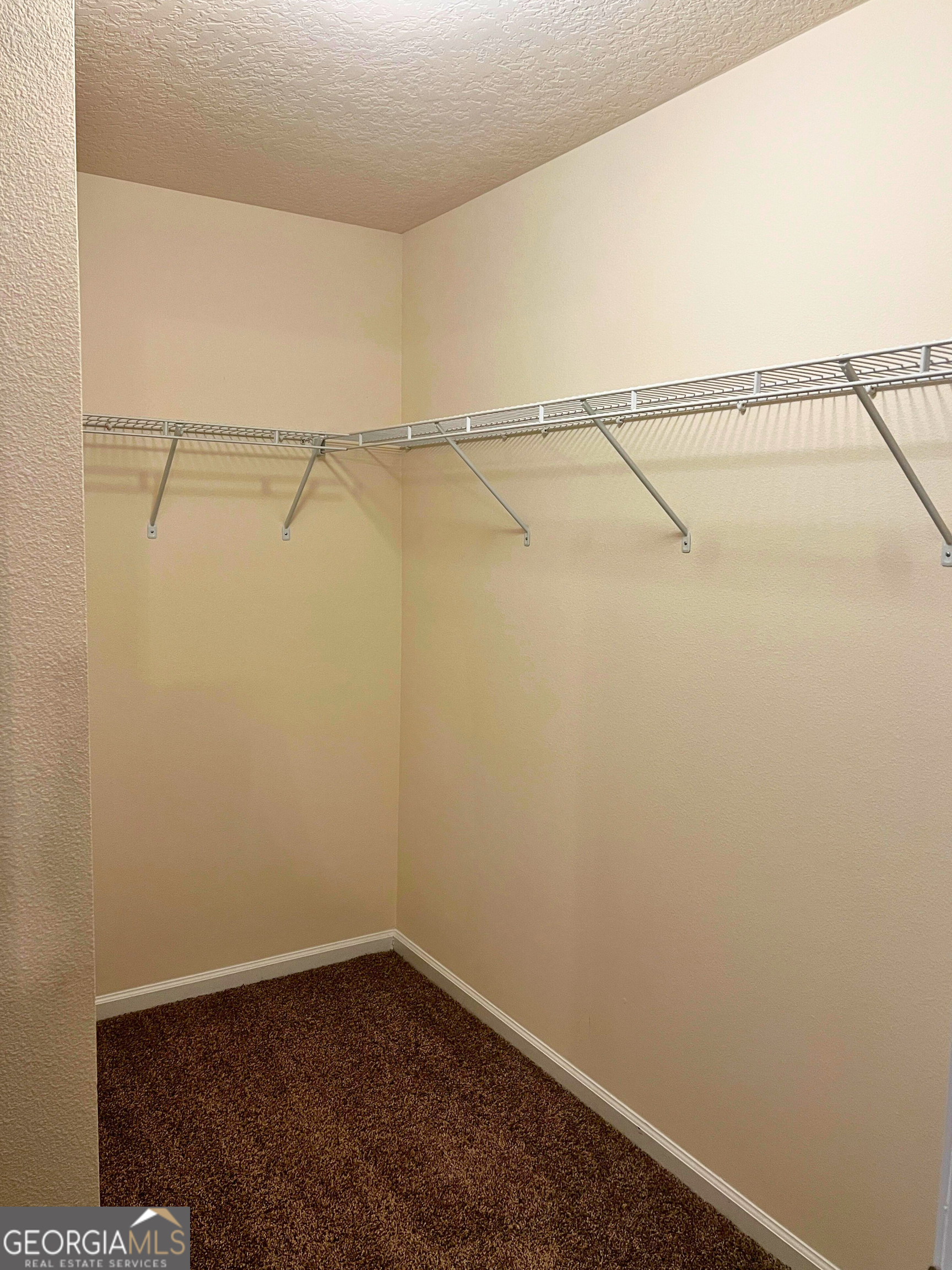 129 Holston Circle Kingsland, GA 31548 - Photo 23 of 25 a view of small space with racks on the wall