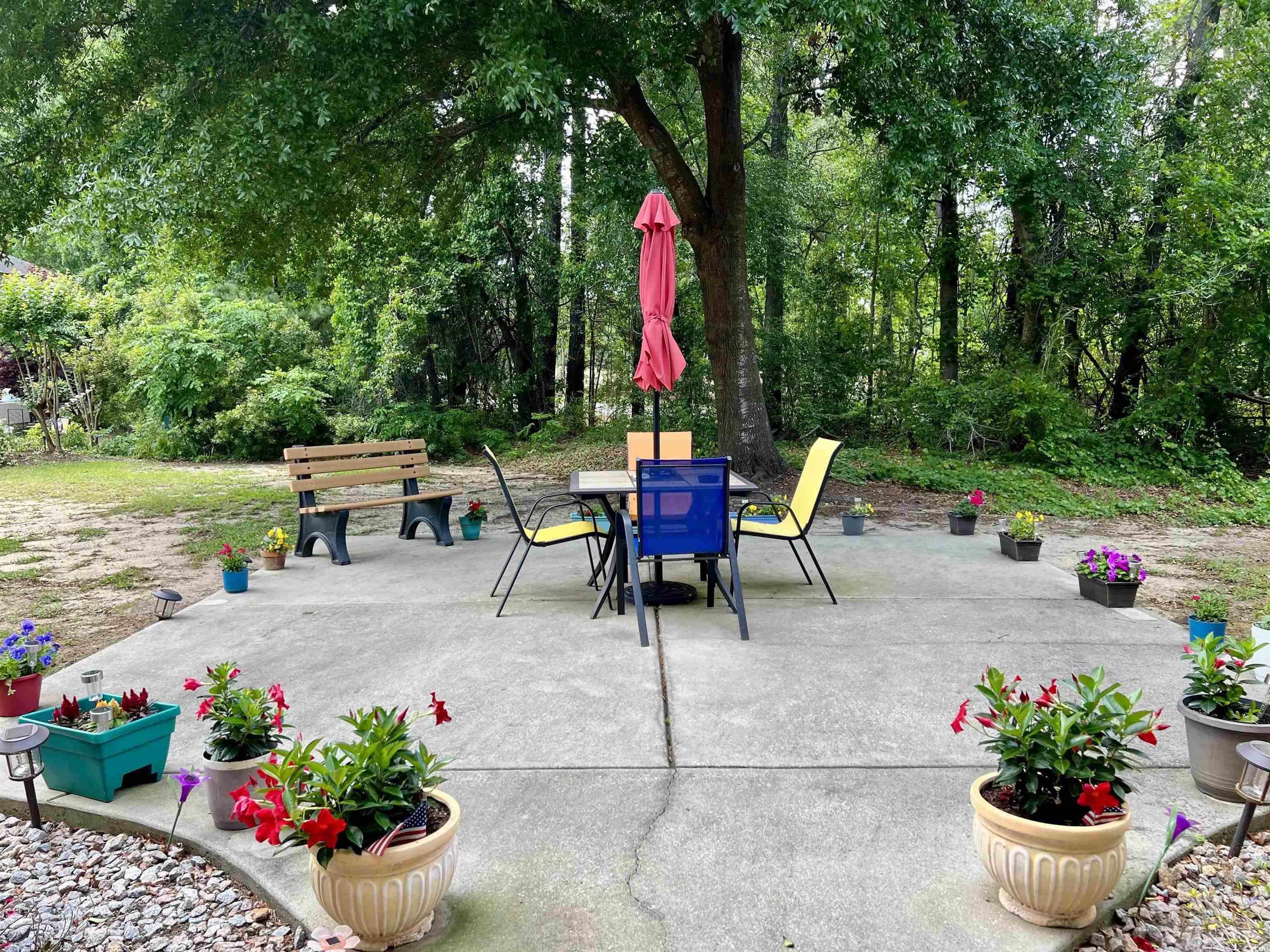 4394 Daphne Lane, Unit F Murrells Inlet, SC 29576 - Photo 35 of 40 View of patio / terrace featuring outdoor dining space