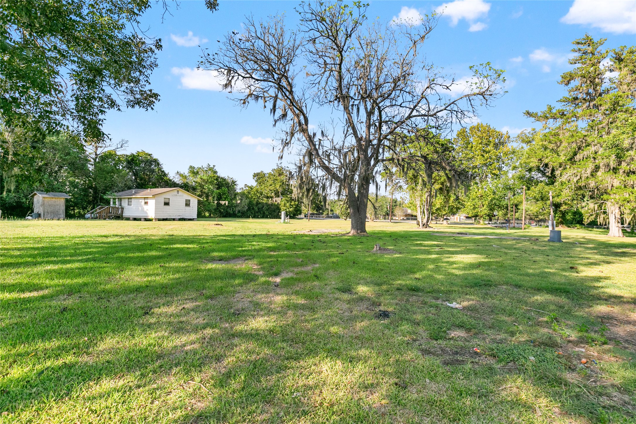 3014 Farm To Market 524 Road Sweeny, TX 77480 - Photo 6 of 18 This 6.7-acre unrestricted property offers a beautiful mix of cleared land and mature trees, giving you usable space while keeping the lush, country feel.