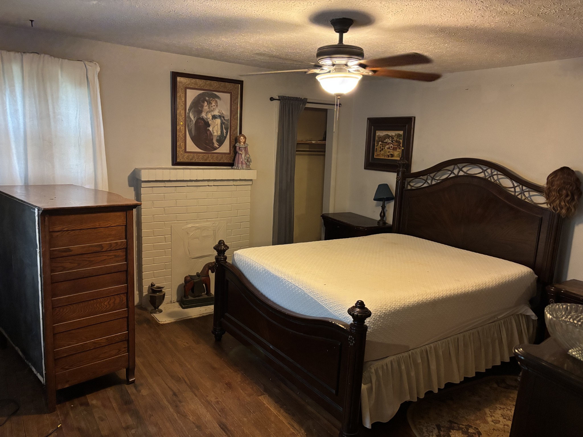 686 Clearview Road Cottontown, TN 37048 - Photo 11 of 22 a bedroom with a bed and a chandelier