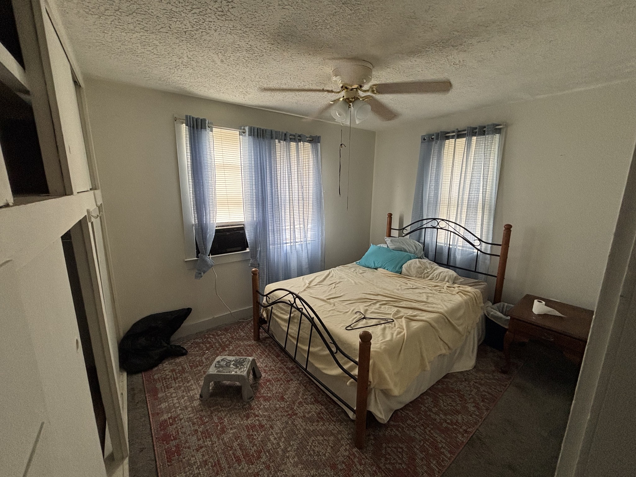 686 Clearview Road Cottontown, TN 37048 - Photo 12 of 22 a bedroom with a bed wooden floor and window