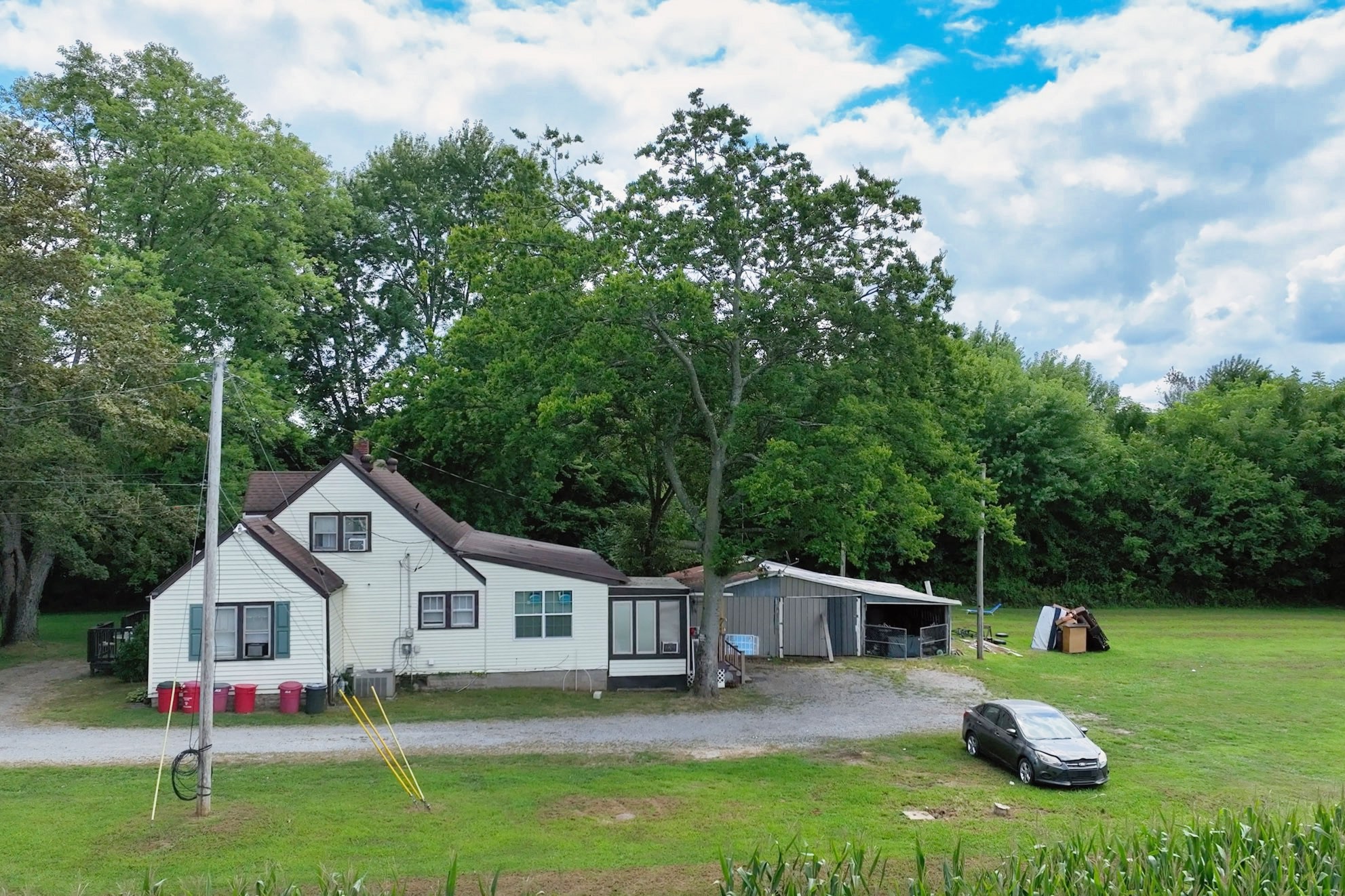 686 Clearview Road Cottontown, TN 37048 - Photo 2 of 22 a front view of a house with garden