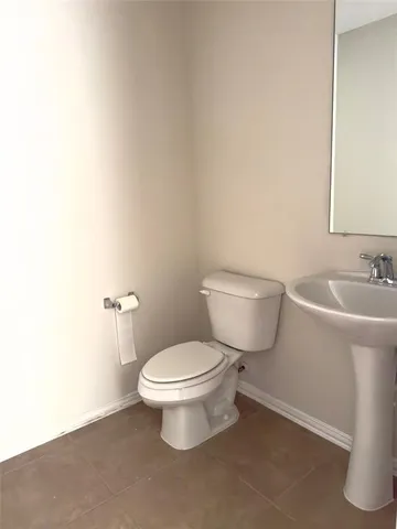 an empty room with a empty space and windows