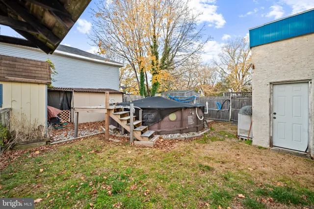 a view of a backyard with patio
