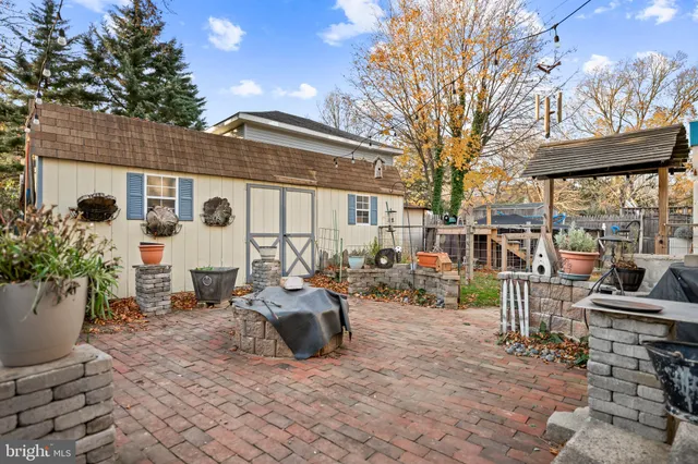 a view of a chair and tables in the patio