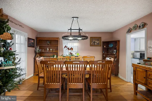 a view of a dining room with furniture