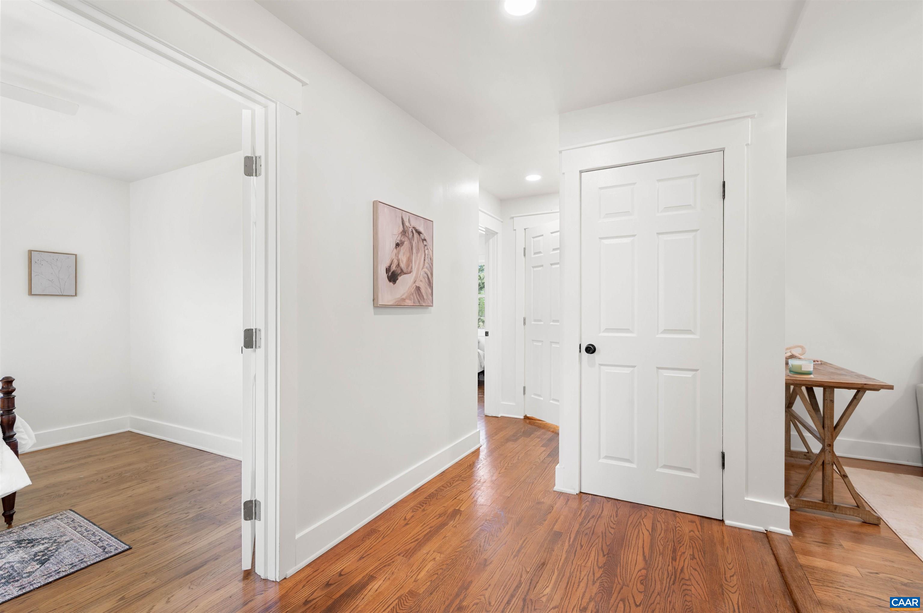 1867 Stage Junction Road Columbia, VA 23038 - Photo 14 of 46 a view of a hallway with wooden floor and closet area