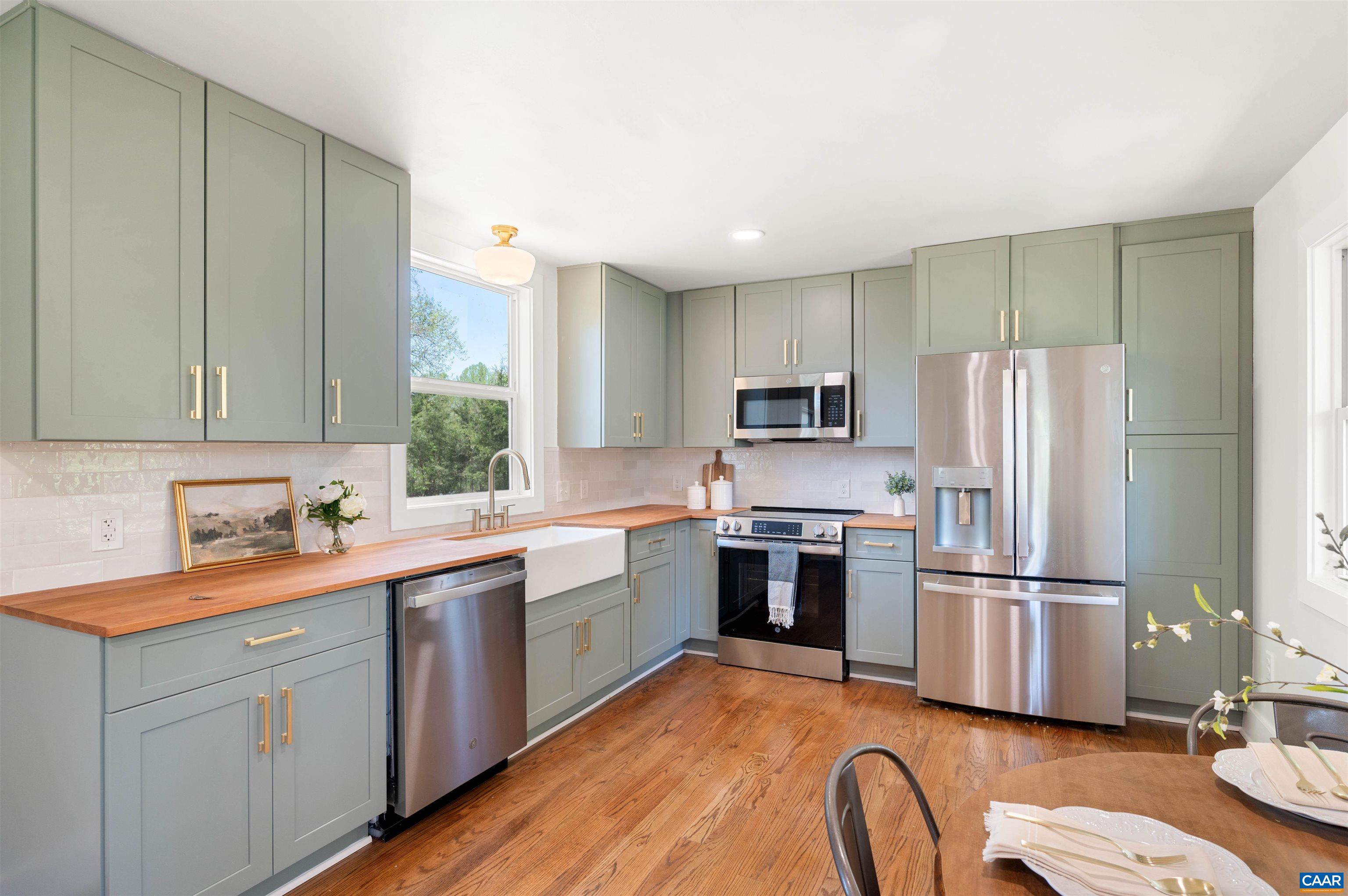 1867 Stage Junction Road Columbia, VA 23038 - Photo 19 of 46 a kitchen with a sink stainless steel appliances and window