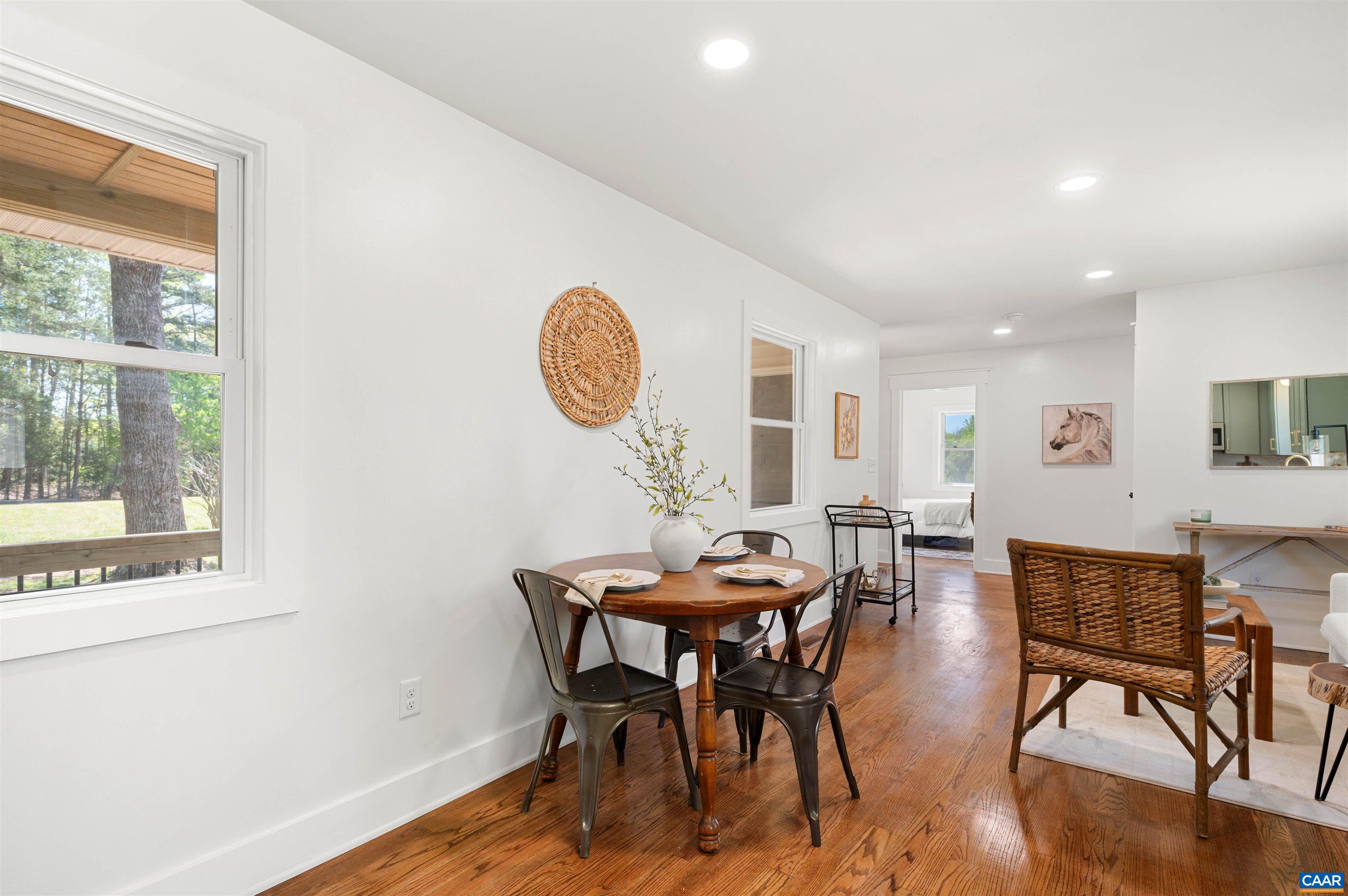 1867 Stage Junction Road Columbia, VA 23038 - Photo 25 of 46 a view of a dining room with furniture and wooden floor
