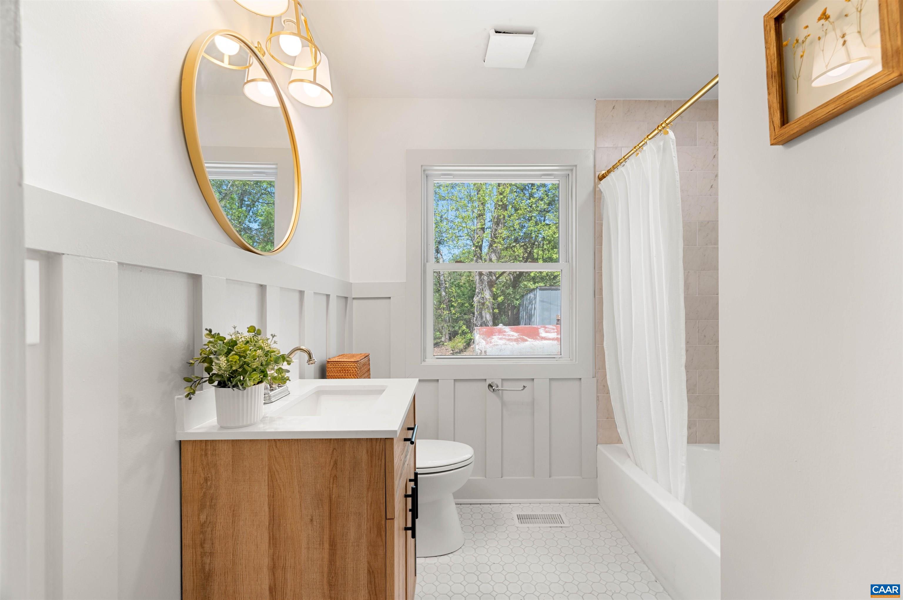 1867 Stage Junction Road Columbia, VA 23038 - Photo 30 of 46 a bathroom with a sink mirror and a window