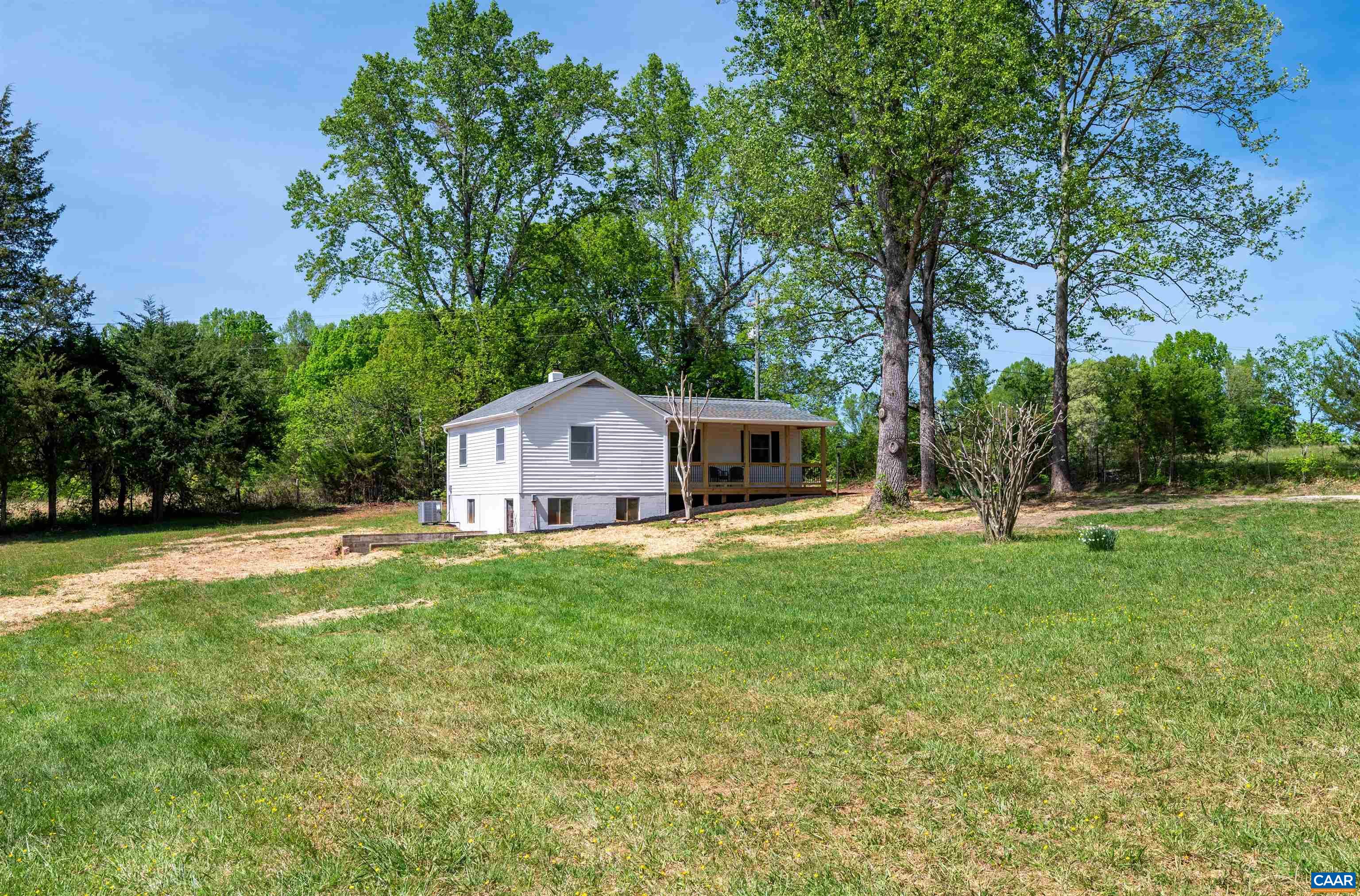 1867 Stage Junction Road Columbia, VA 23038 - Photo 3 of 46 a front view of a house with garden