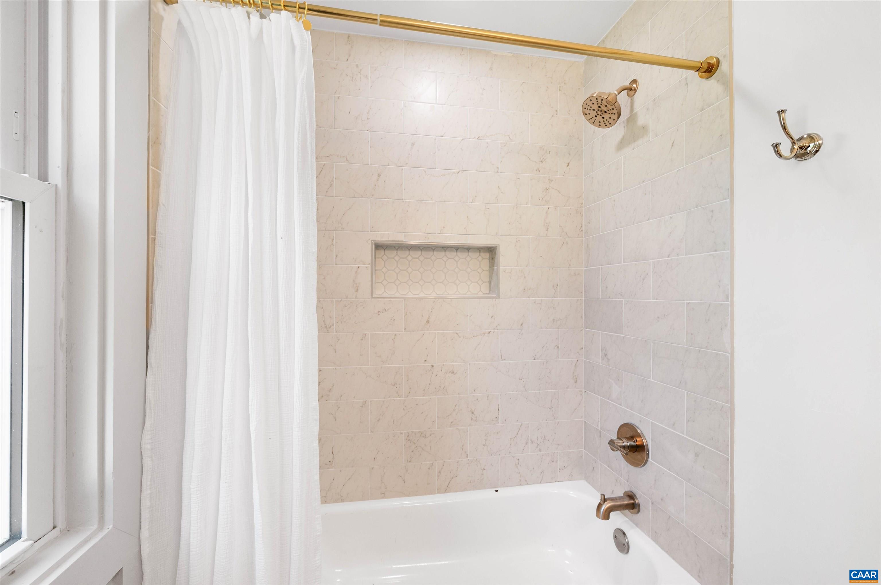 1867 Stage Junction Road Columbia, VA 23038 - Photo 33 of 46 a bathroom with a shower and a tub
