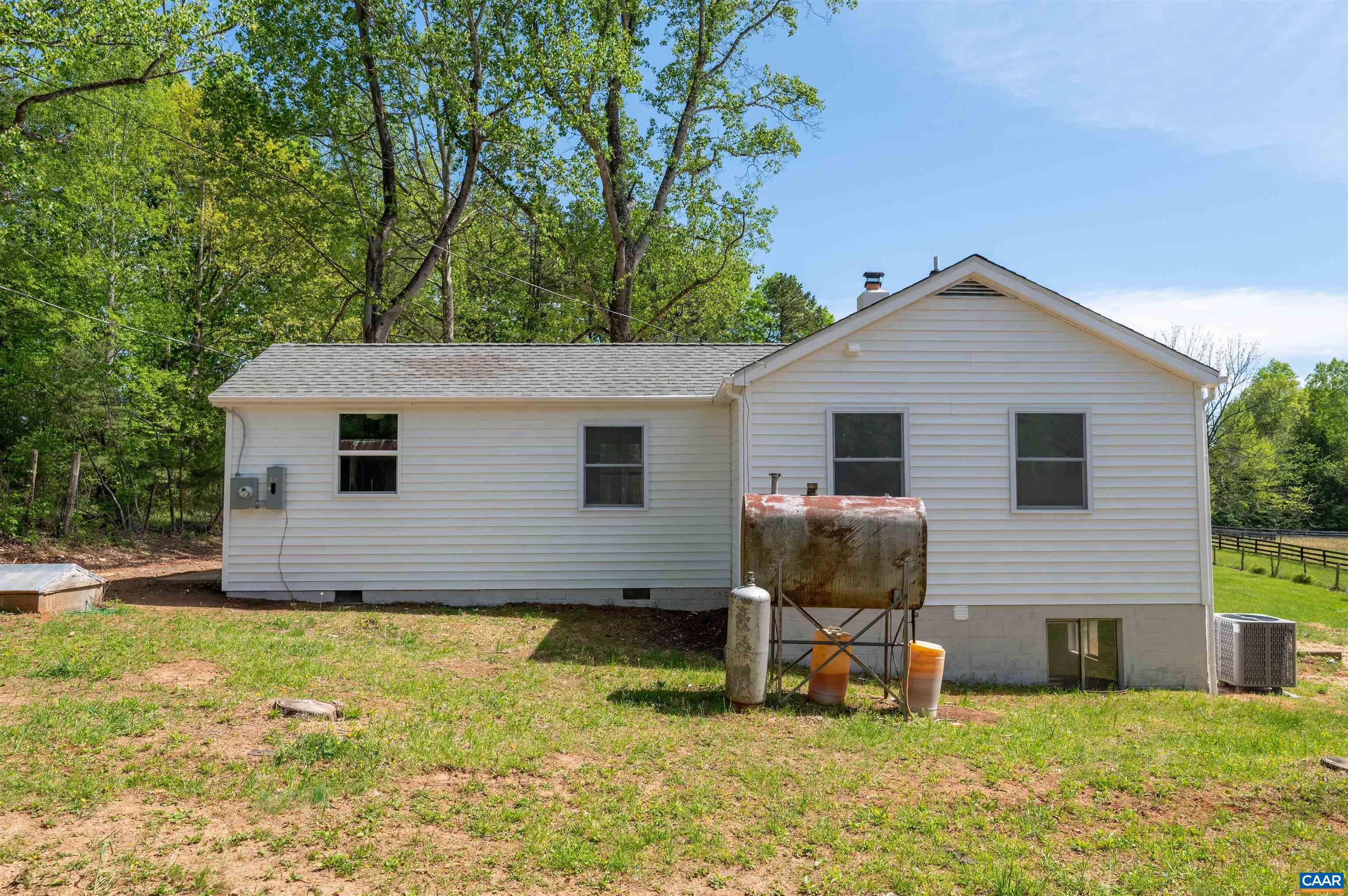 1867 Stage Junction Road Columbia, VA 23038 - Photo 36 of 46 a view of a house with a backyard