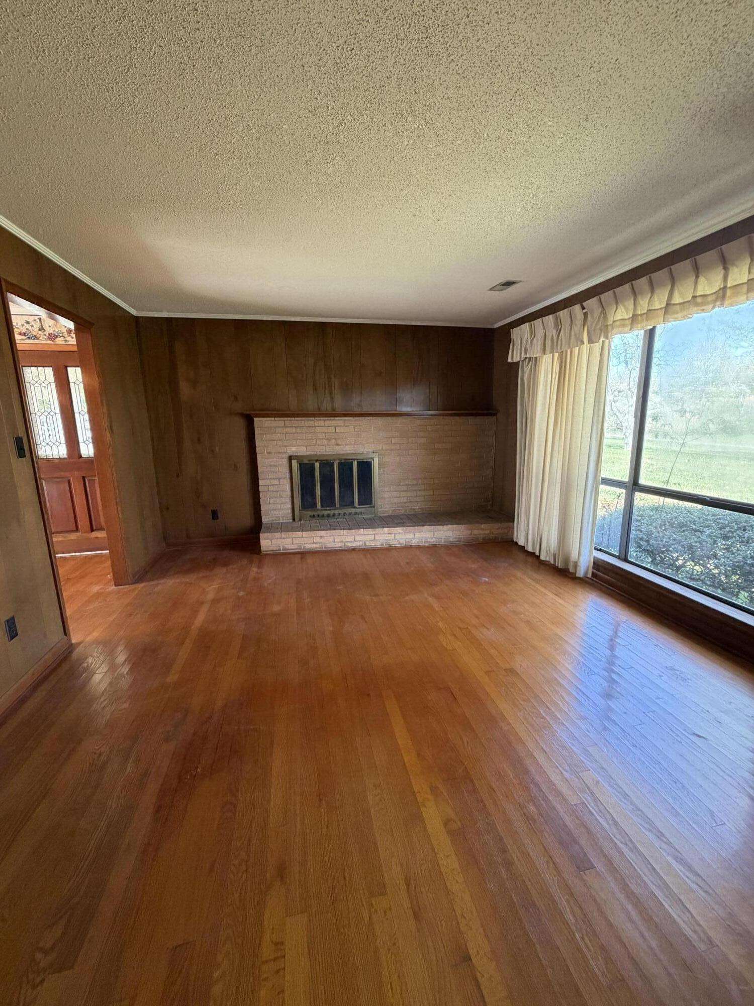 724 Watts Bar Highway Spring City, TN 37381 - Photo 8 of 28 Living room with fireplace