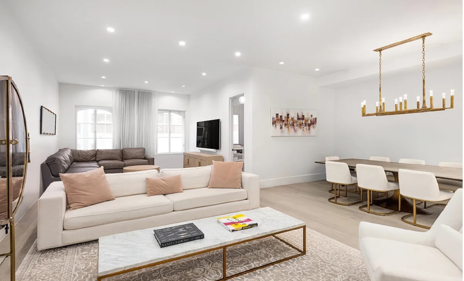 53 Murray Street, Unit 5 Manhattan, NY 10007 - Photo 2 of 11 a living room with furniture and a table