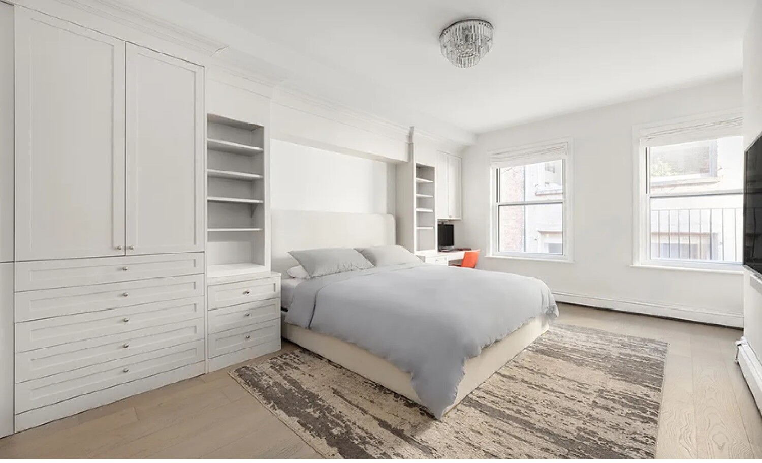 53 Murray Street, Unit 5 Manhattan, NY 10007 - Photo 5 of 11 a bedroom with a bed and a window