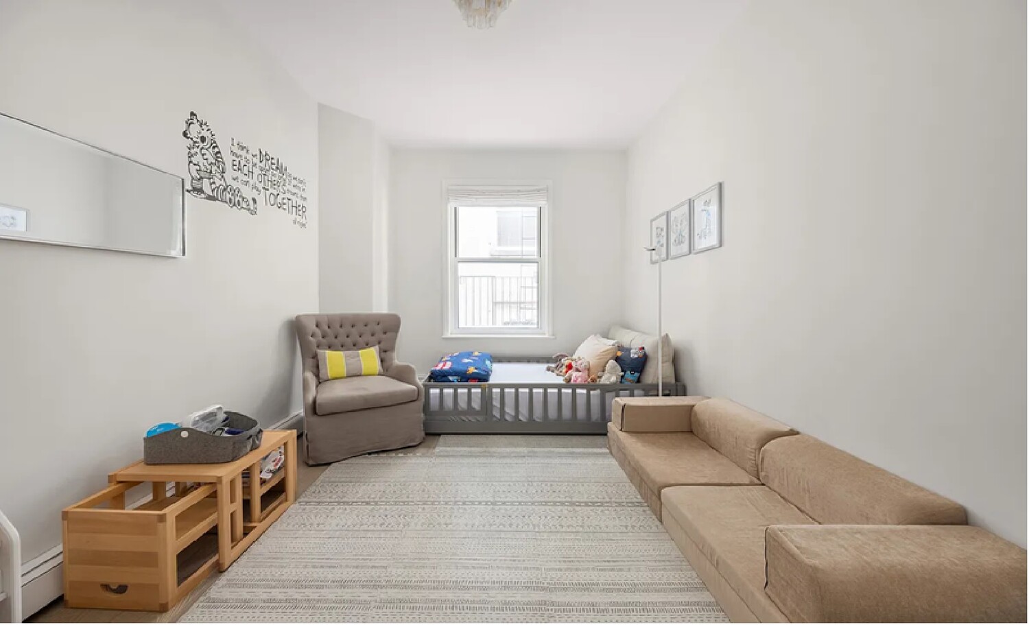 53 Murray Street, Unit 5 Manhattan, NY 10007 - Photo 7 of 11 a living room with furniture and a window