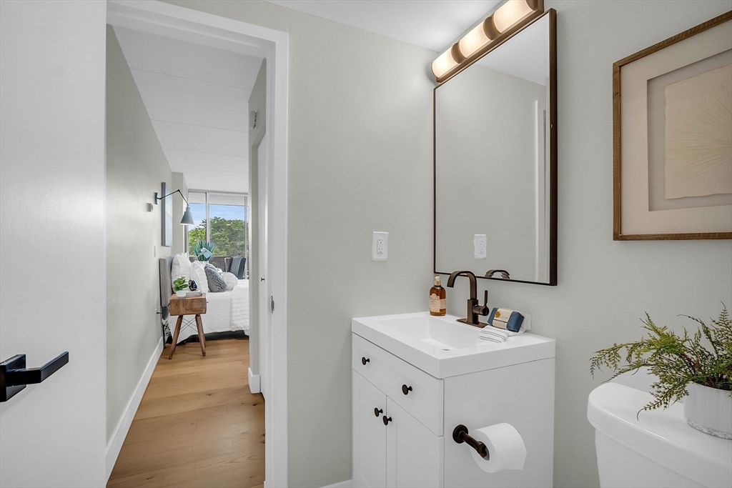 200 Swanton Street, Unit 502 Winchester, MA 01890 - Photo 14 of 24 a en suite bathroom with a sink double vanity and a mirror