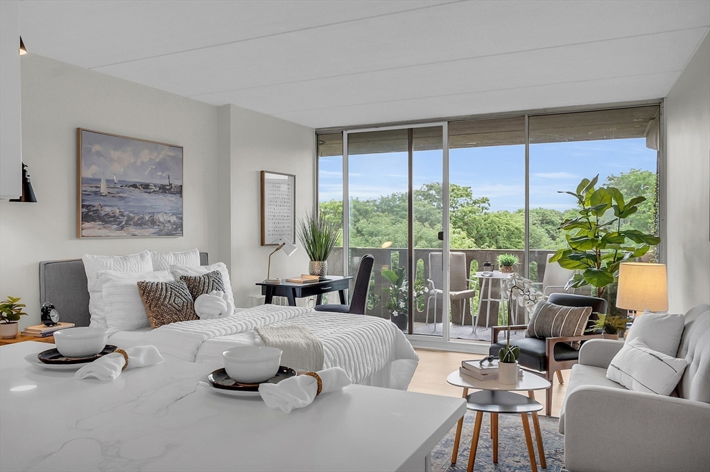 200 Swanton Street, Unit 502 Winchester, MA 01890 - Photo 7 of 24 a living room with furniture and a large window