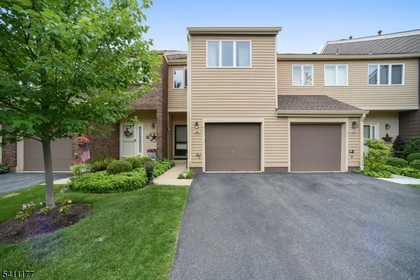 front view of a house and a yard