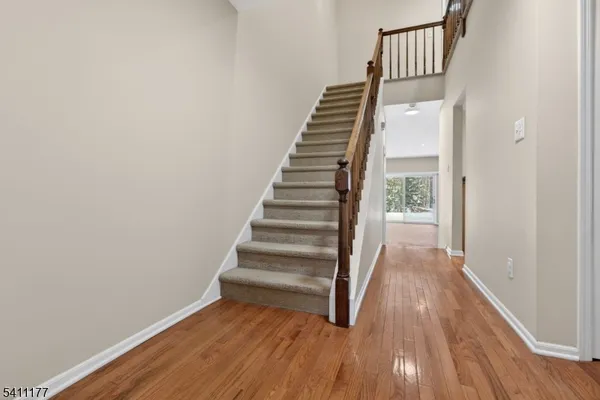 a view of entryway with wooden floor