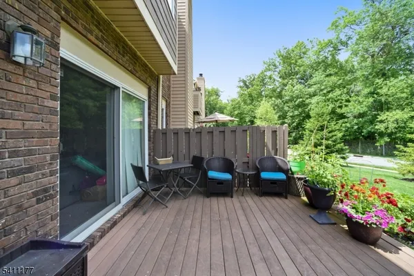 a view of a chairs on the deck