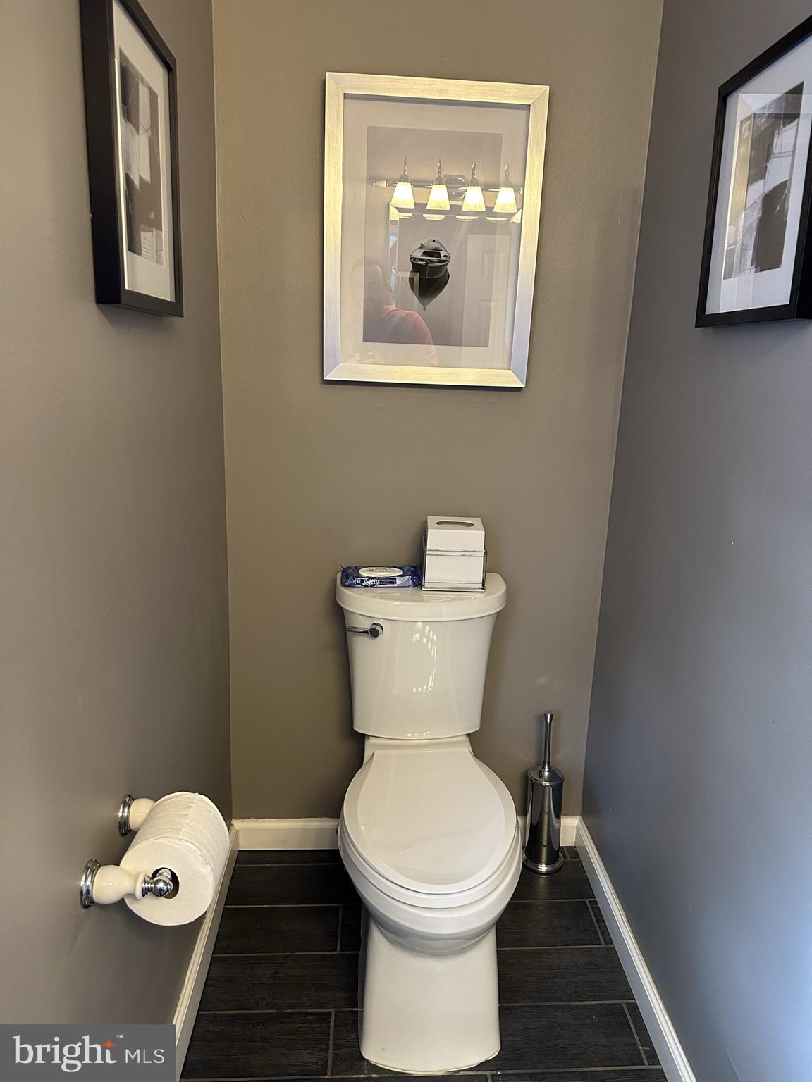 2269 Pine Road Huntingdon Valley, PA 19006 - Photo 18 of 61 a white toilet sitting next to a small bathroom
