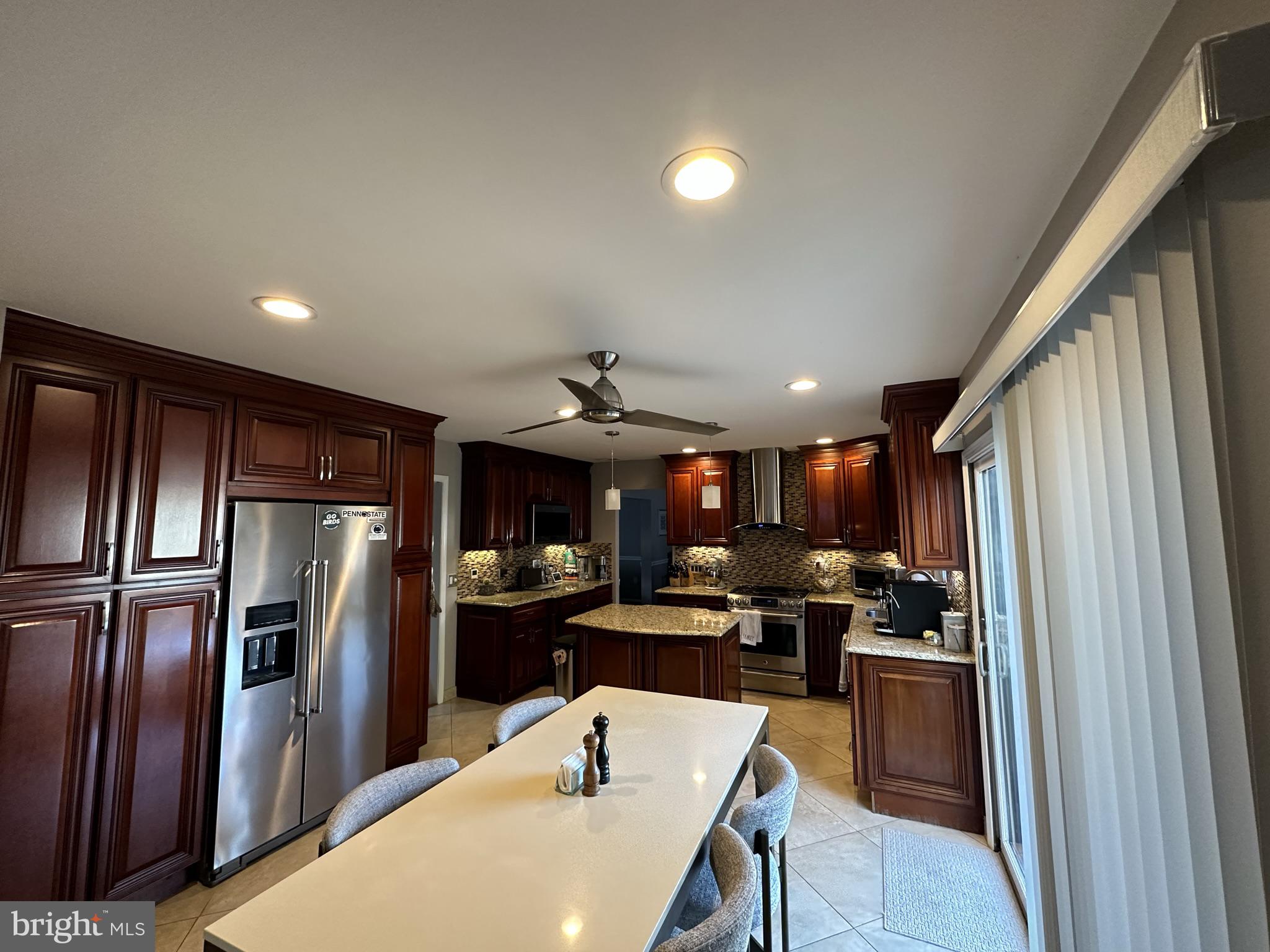 2269 Pine Road Huntingdon Valley, PA 19006 - Photo 21 of 61 a kitchen with refrigerator a stove and cabinets