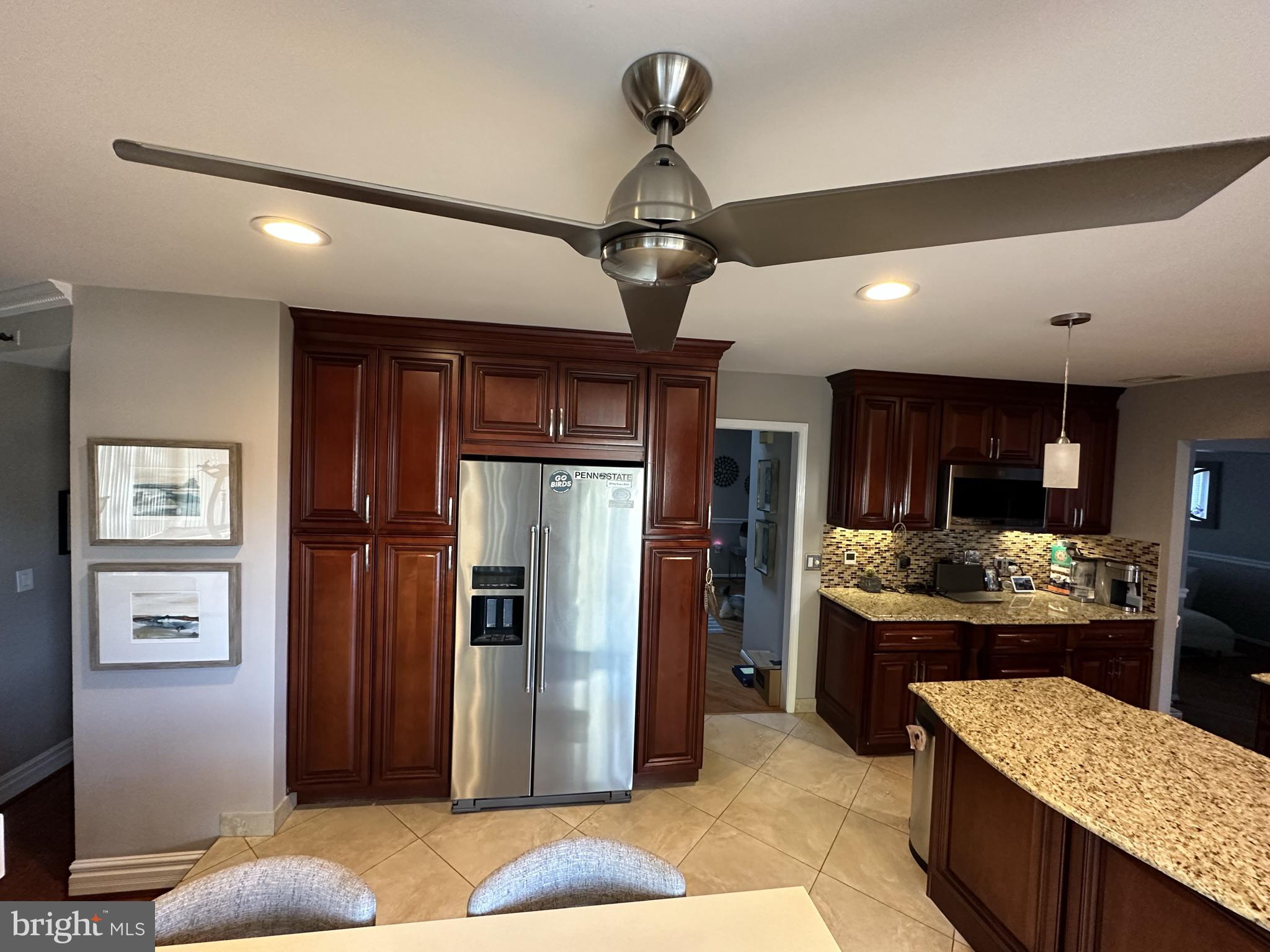 2269 Pine Road Huntingdon Valley, PA 19006 - Photo 22 of 61 a kitchen with stainless steel appliances granite countertop a refrigerator and a sink