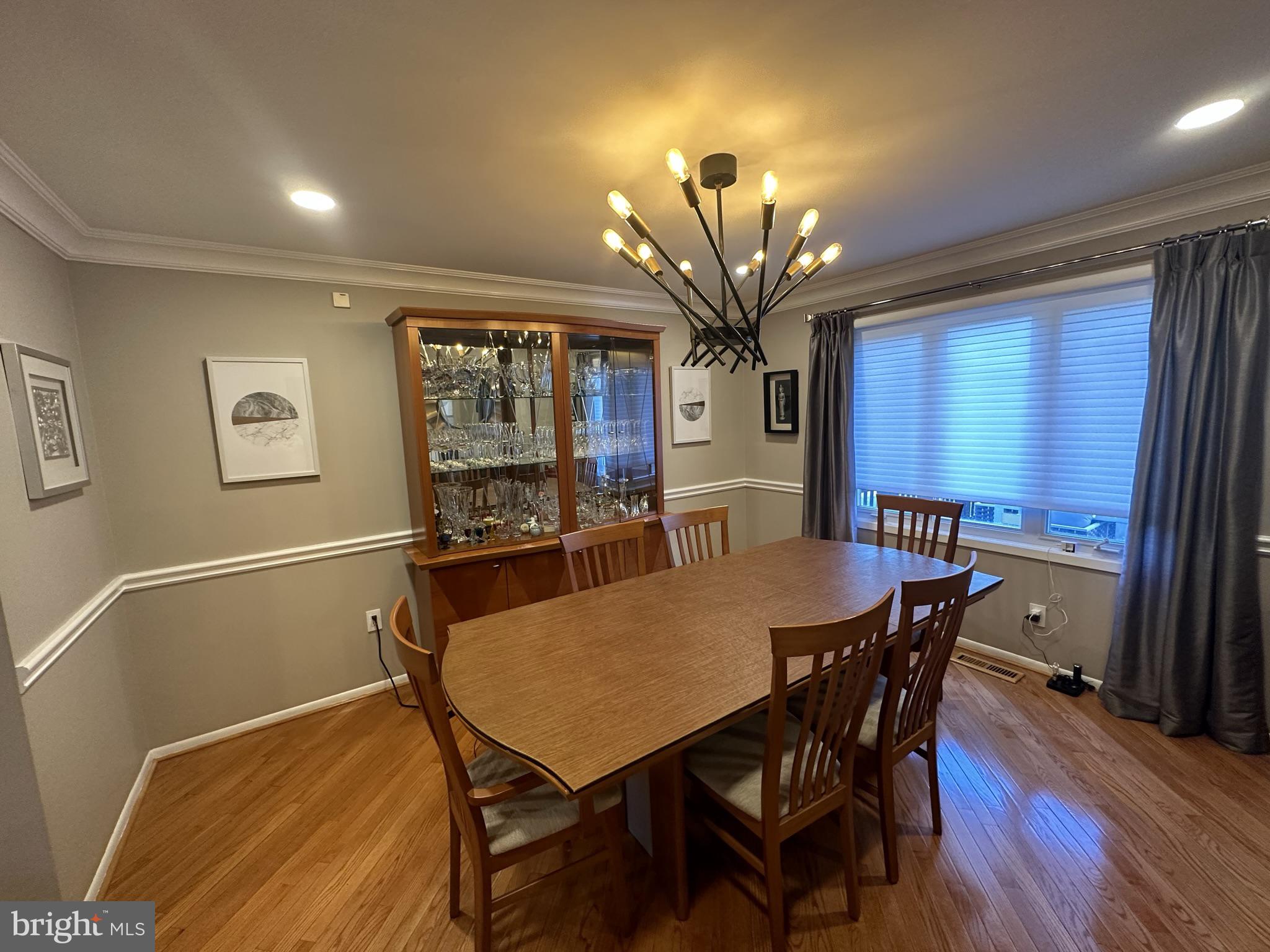2269 Pine Road Huntingdon Valley, PA 19006 - Photo 29 of 61 a view of a dining room with furniture and a chandelier