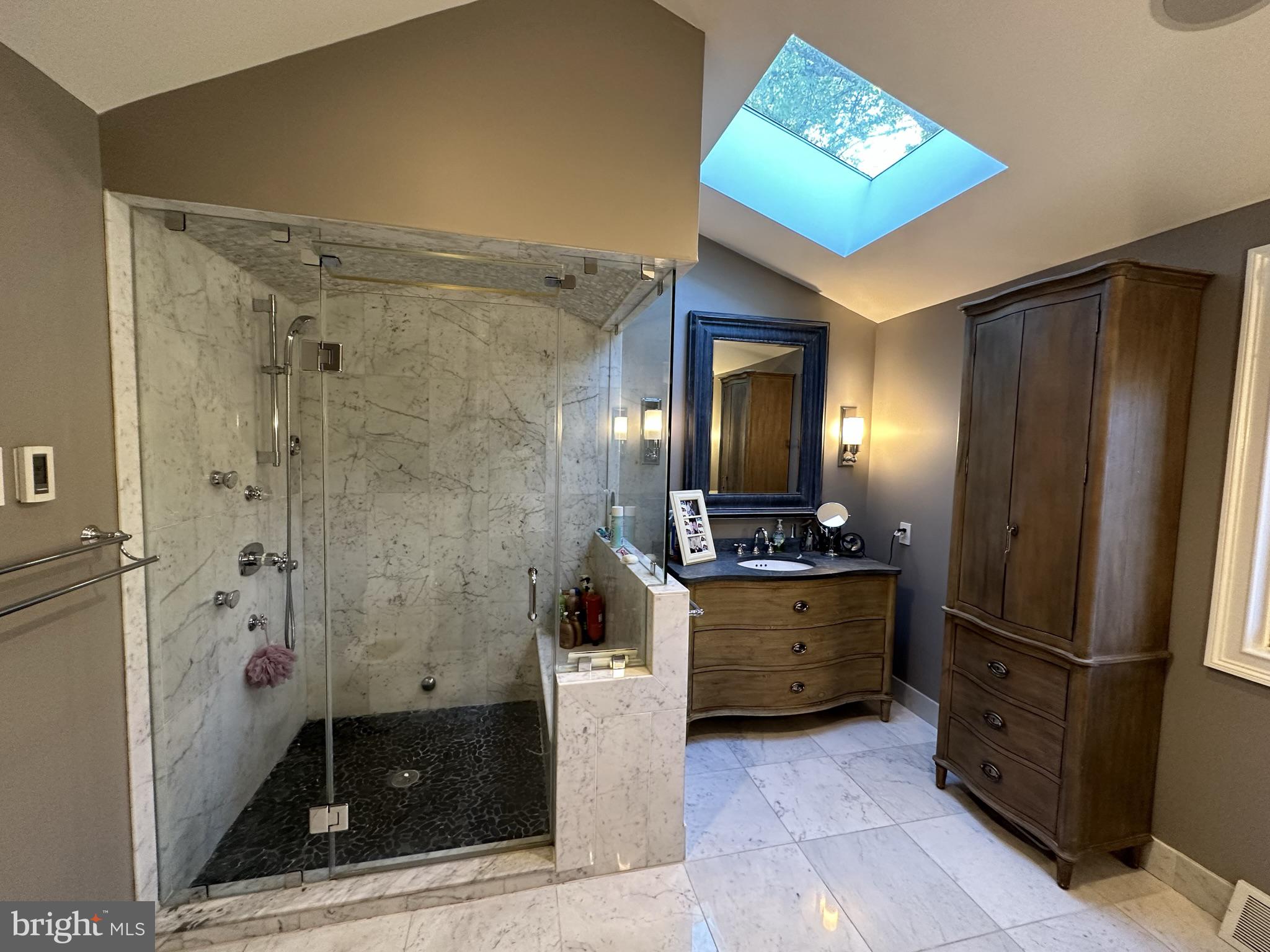 2269 Pine Road Huntingdon Valley, PA 19006 - Photo 36 of 61 a bathroom with a mirror and a shower