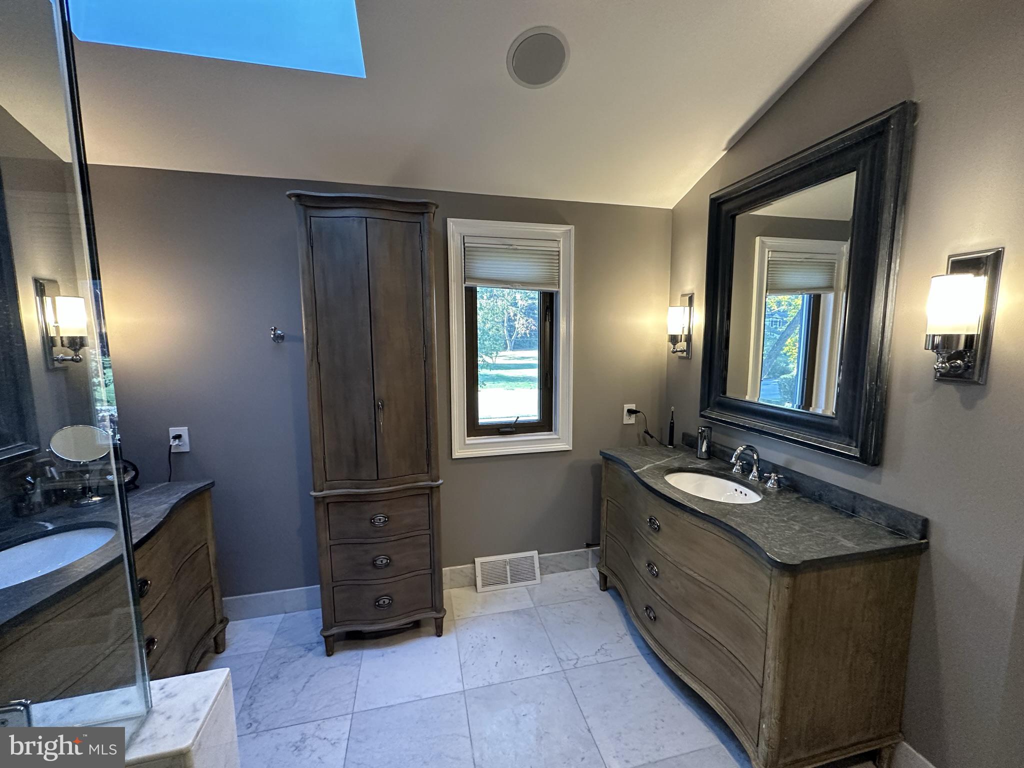 2269 Pine Road Huntingdon Valley, PA 19006 - Photo 37 of 61 a bathroom with a sink a mirror and a vanity