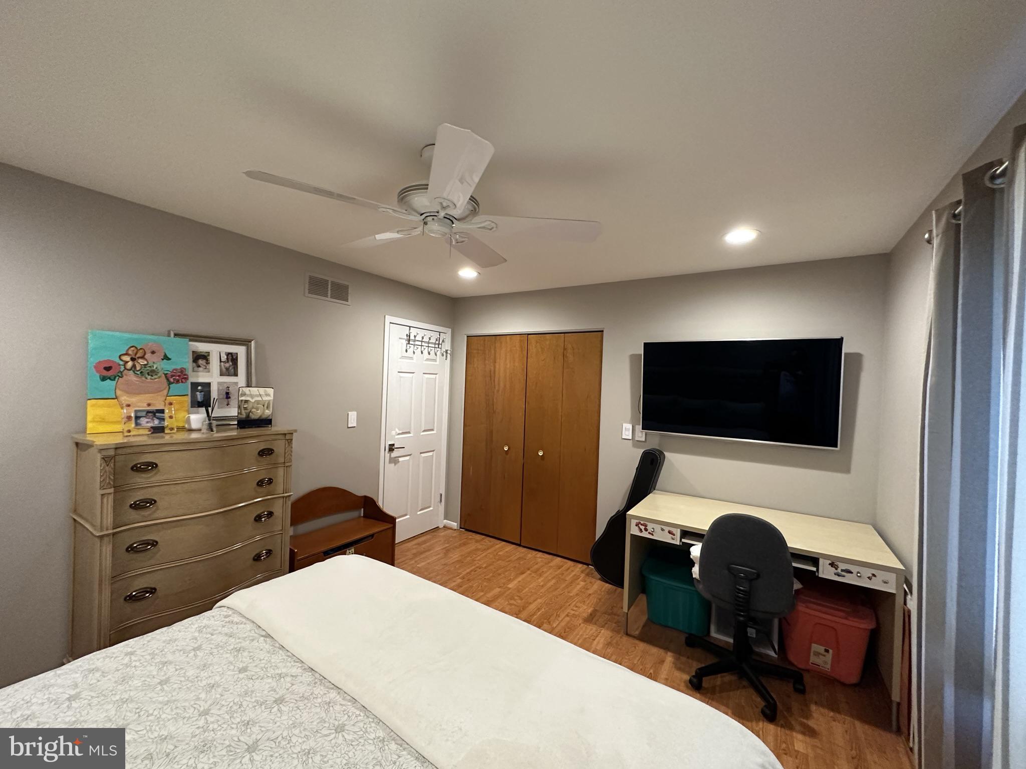 2269 Pine Road Huntingdon Valley, PA 19006 - Photo 39 of 61 a bedroom with a bed and a flat screen tv