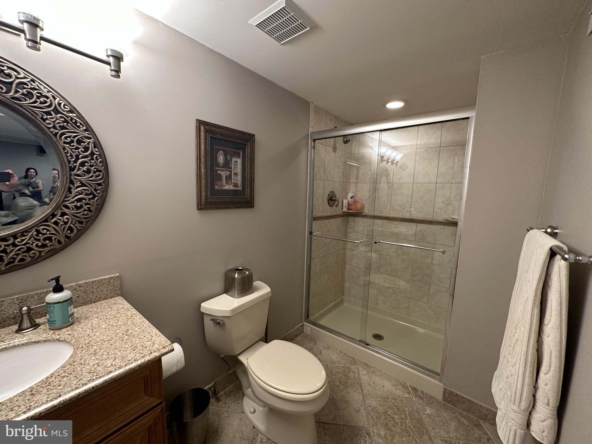 2269 Pine Road Huntingdon Valley, PA 19006 - Photo 49 of 61 a bathroom with a granite countertop sink toilet and shower