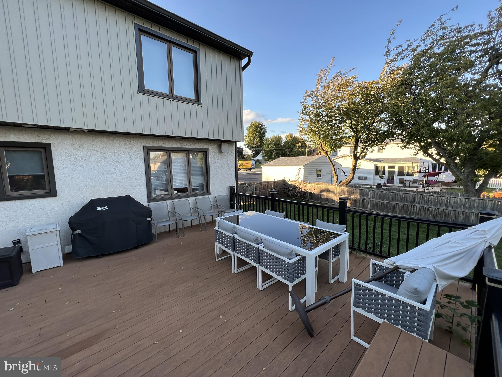 2269 Pine Road Huntingdon Valley, PA 19006 - Photo 52 of 61 a view of a roof deck with wooden floor and fence