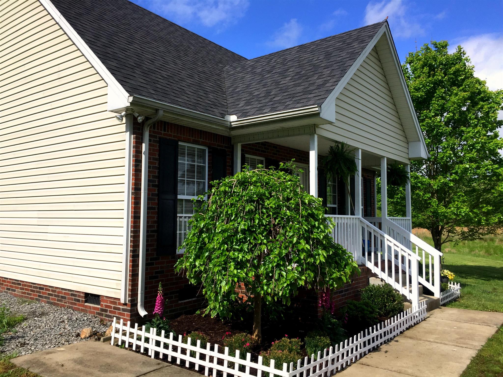 357 Corinth Road Portland, TN 37148 - Photo 2 of 11 Beautiful landscaping almost all new!