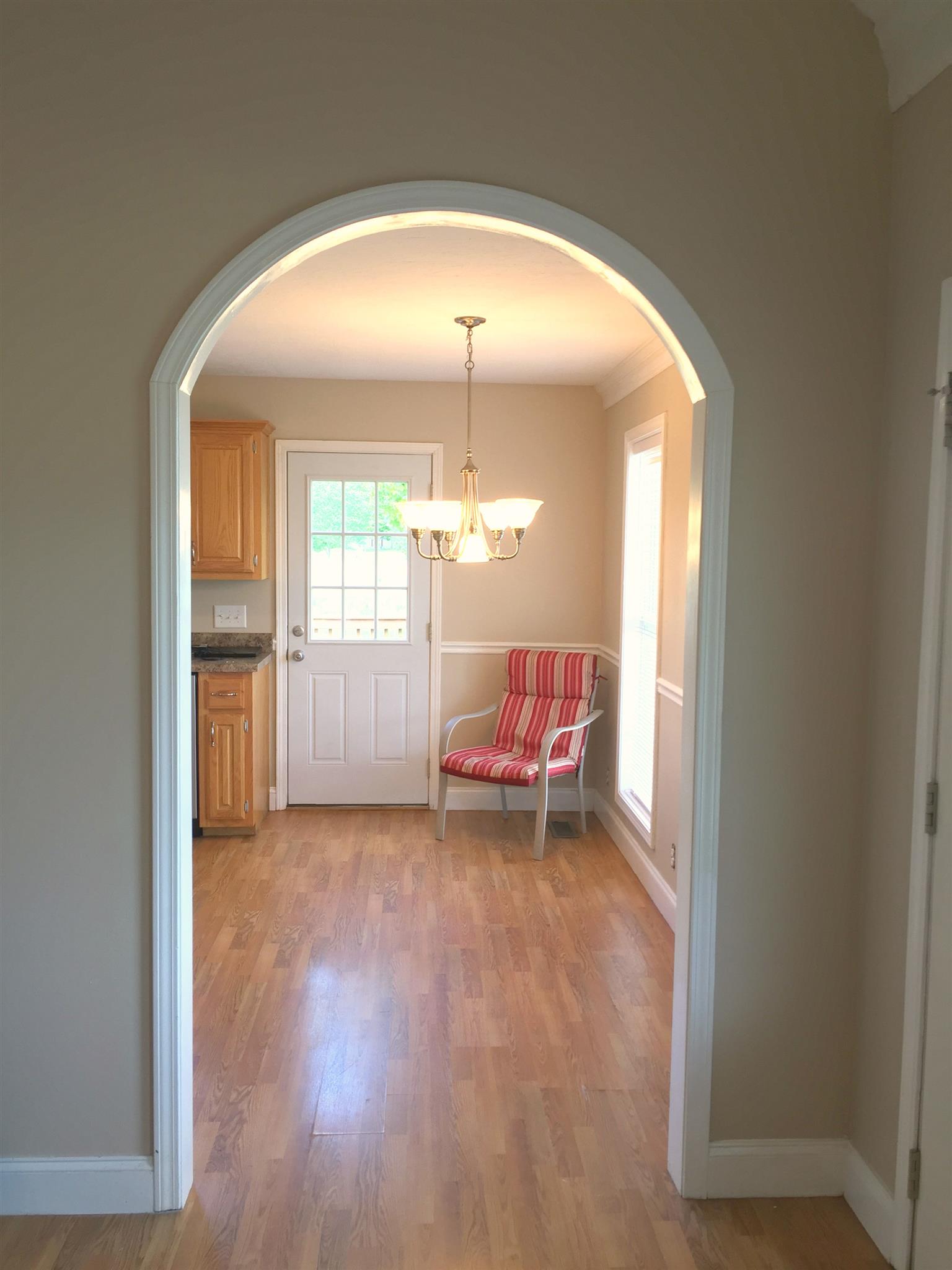 357 Corinth Road Portland, TN 37148 - Photo 7 of 11 Archway leading from Living Room to Kitchen/Dining area