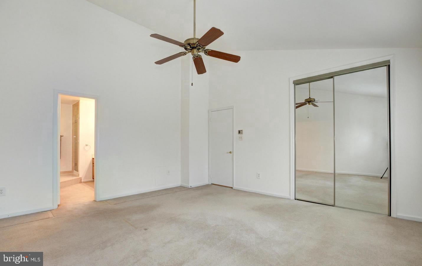 10922 Brewer House Road Rockville, MD 20852 - Photo 12 of 24 Spacious Primary Bedroom with Vaulted Ceiling
