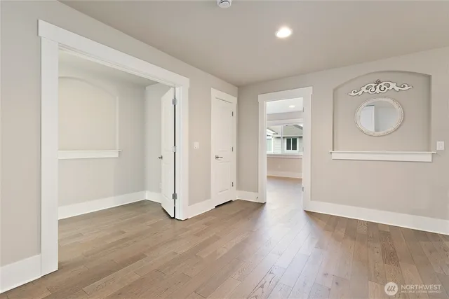 an empty room with large window