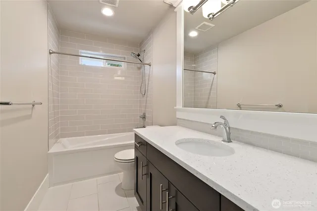 a utility room with a sink a washer and dryer