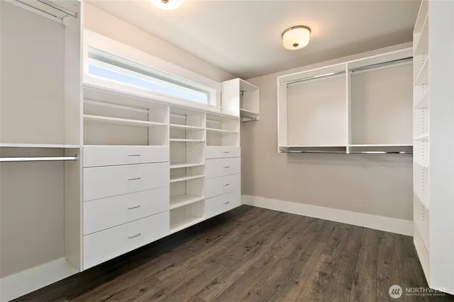 a view of empty room with windows