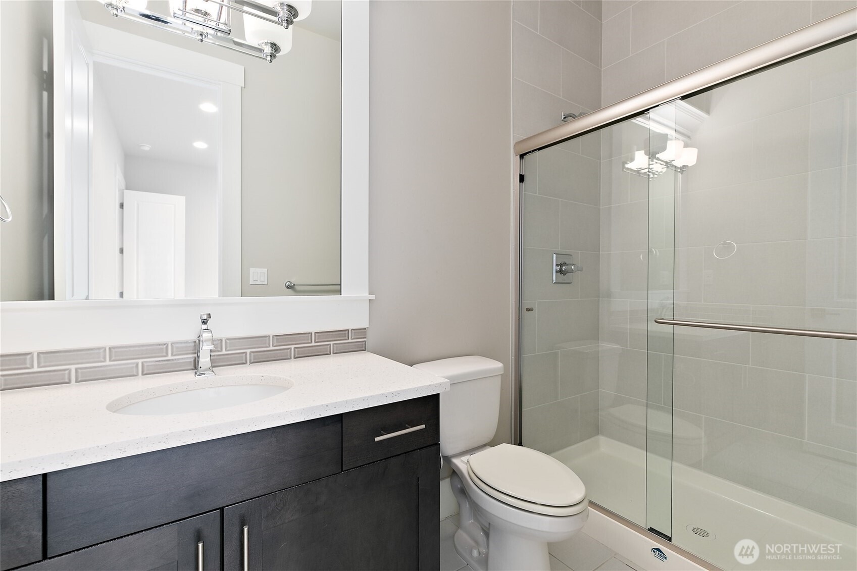 11575 Southeast 81st Street Newcastle, WA 98056 - Photo 9 of 40 a bathroom with a sink toilet and shower