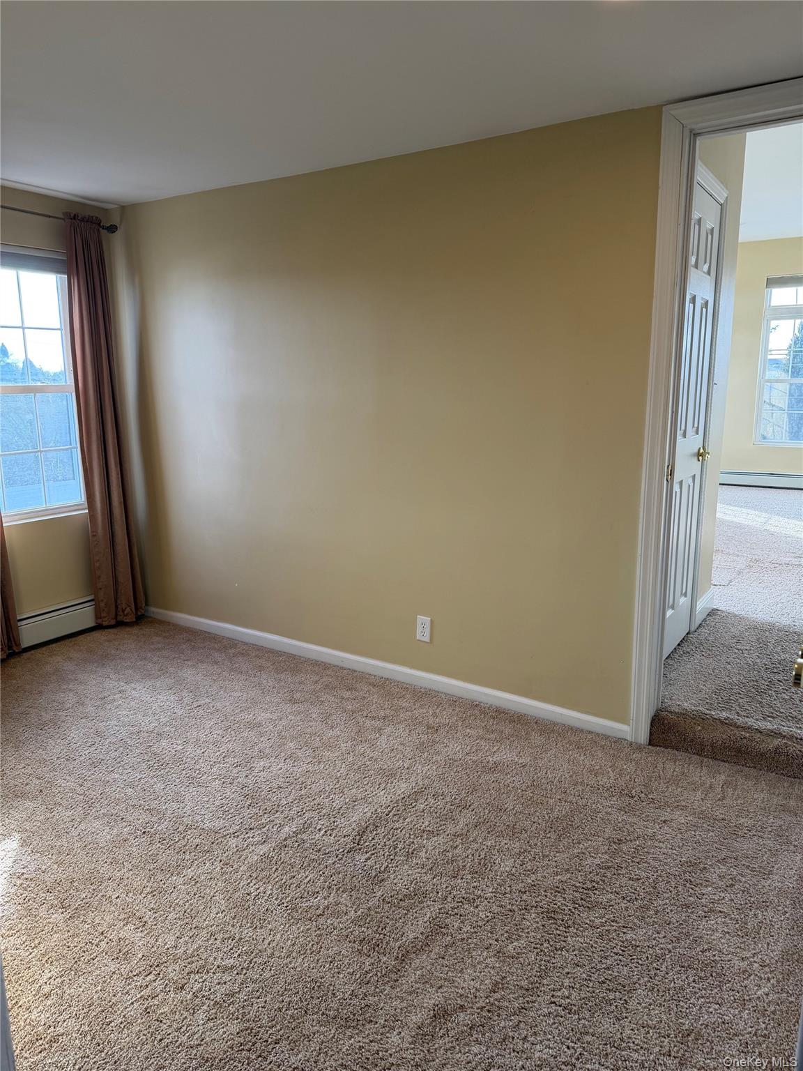 72 North Fordham Road Hicksville, NY 11801 - Photo 18 of 27 an empty room with windows