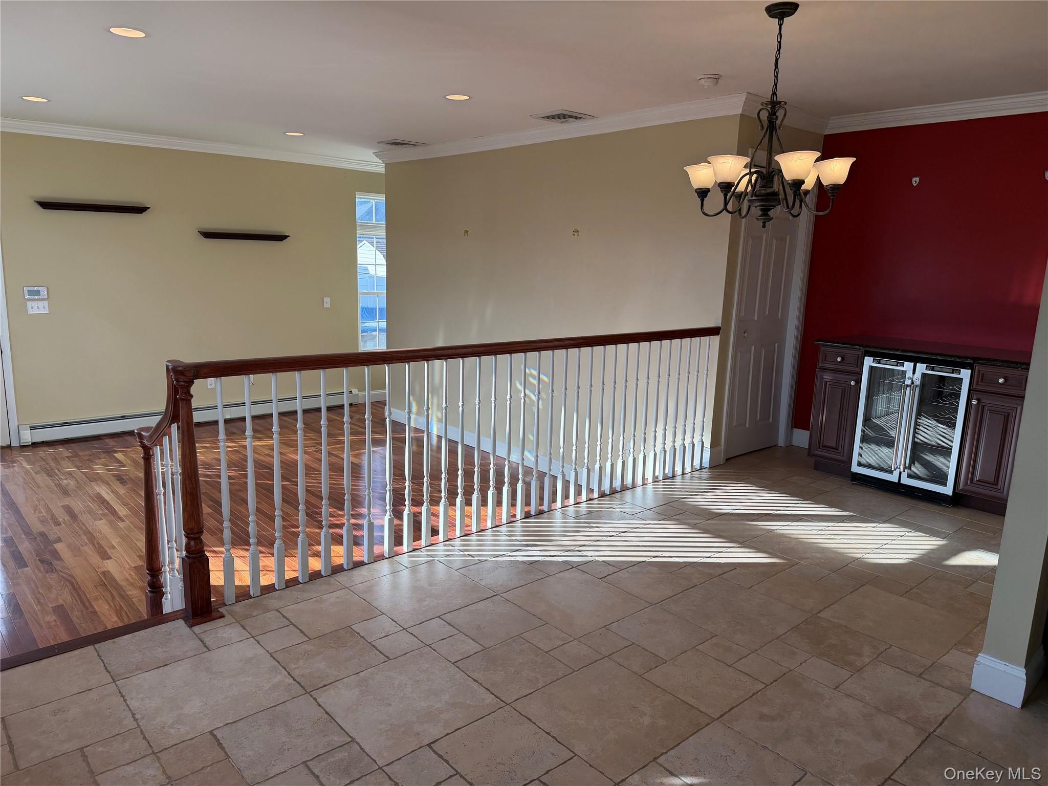 72 North Fordham Road Hicksville, NY 11801 - Photo 9 of 27 a view of a livingroom with furniture and chandelier