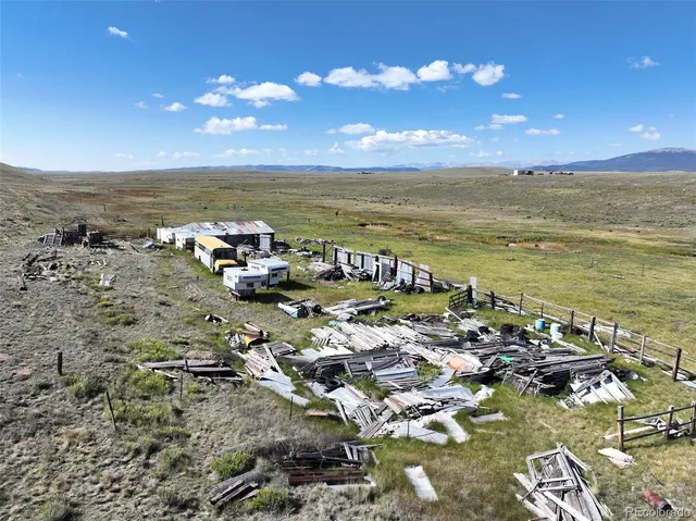 a terrace of a house with outdoor seating