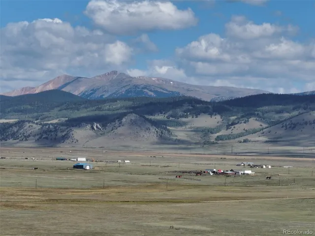 a view of ocean and mountain