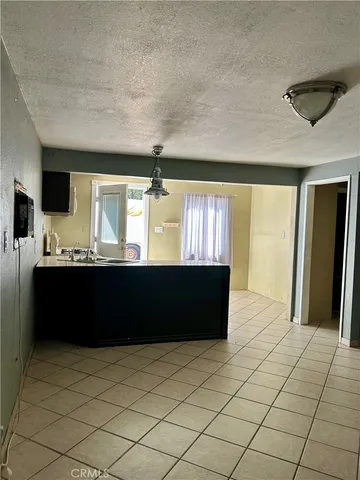 a bathroom with a sink vanity and mirror