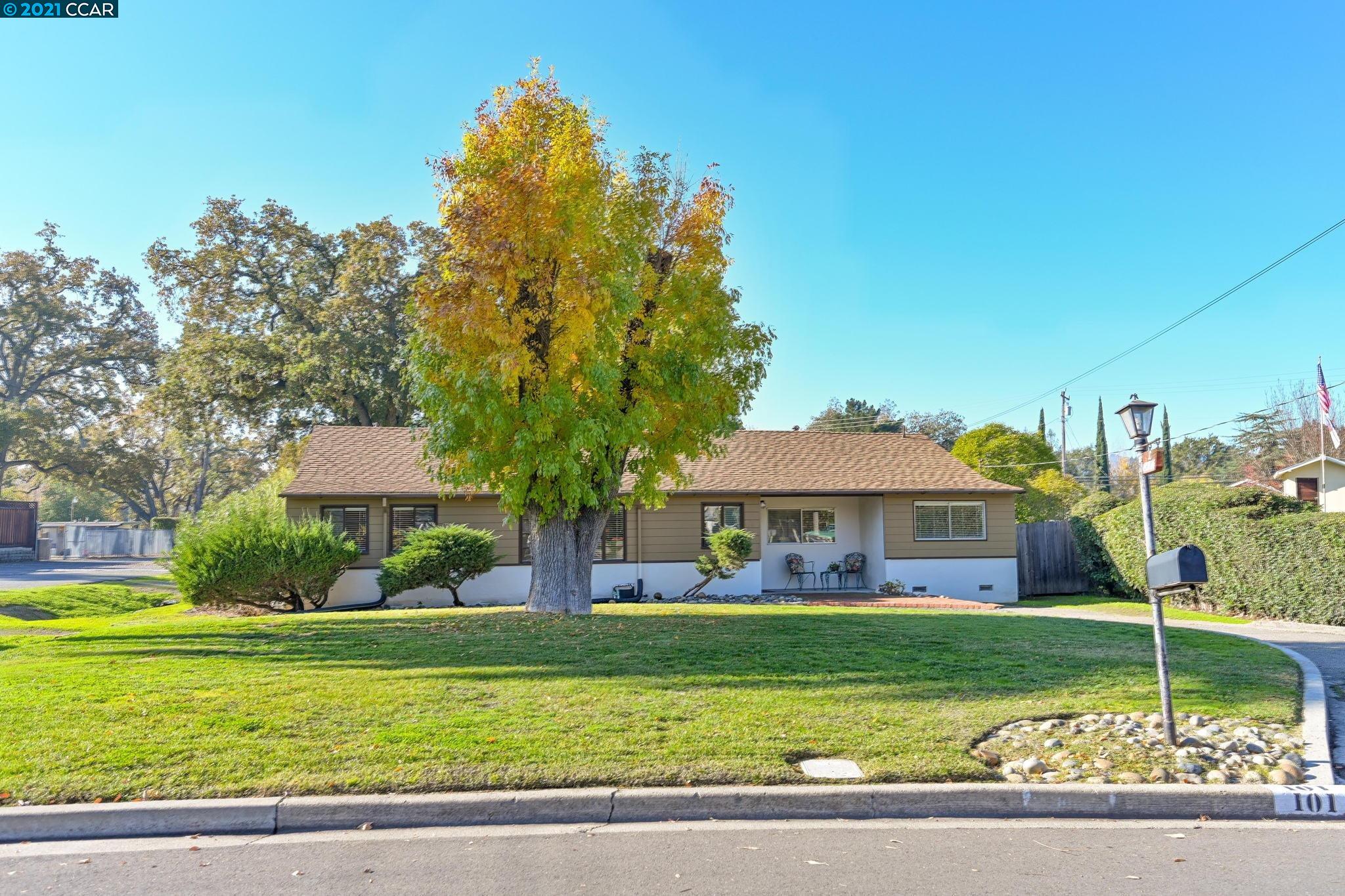 101 Maiden Lane Danville, CA 94526 - Photo 1 of 1 a front view of a house with a garden